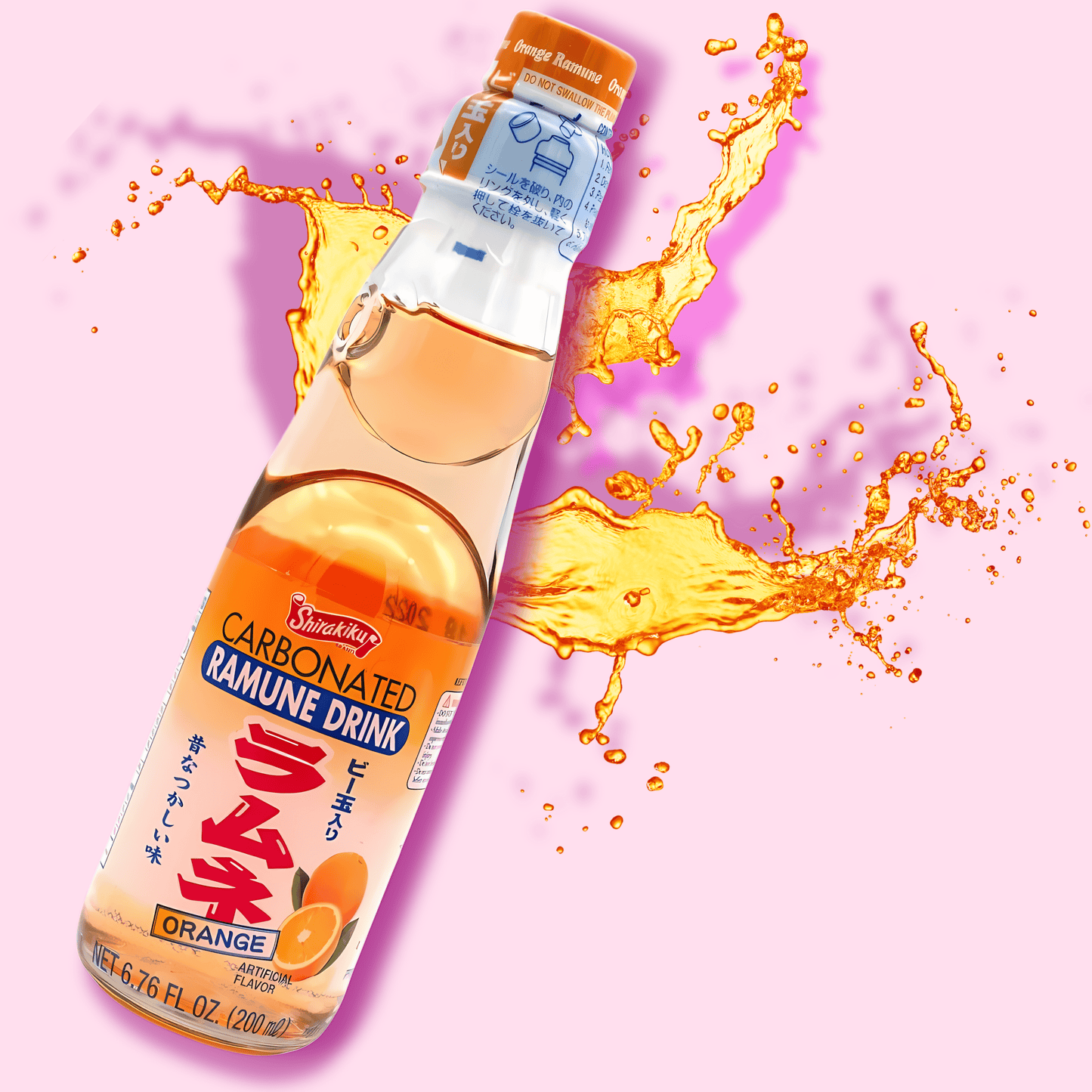 Japanese Ramune soda orange carbonated drink in glass bottle close up - Overrated Korean Beauty & More