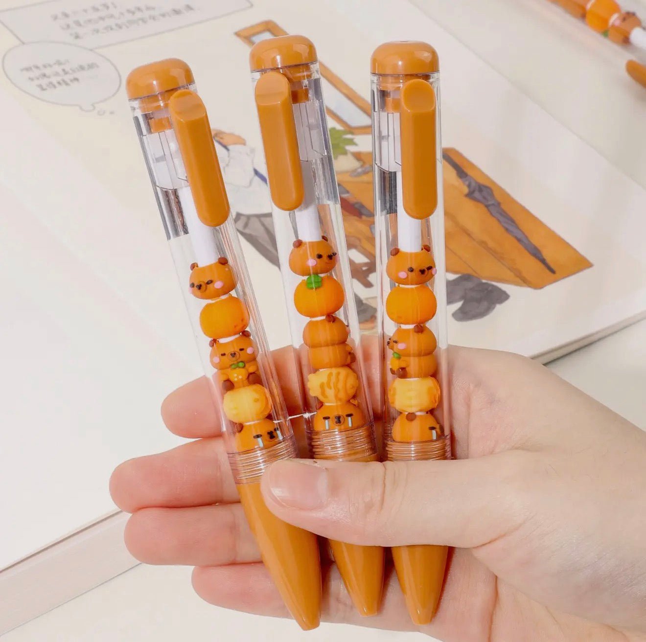 Cute kawaii capybara gel pen close up with smooth ink flow - Overrated Korean Beauty & More