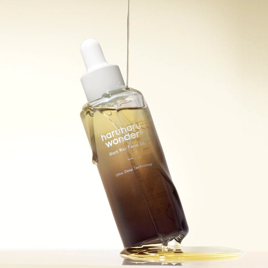 Haruharu Wonder Black Rice facial oil bottle cap open showing dropper tip - Overrated Korean Beauty & More