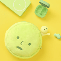 Smiski kawaii pouch bag shown clipped to backpack strap - Overrated Korean Beauty & More