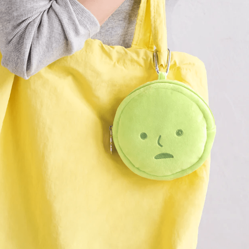 Smiski kawaii pouch bag open showing accessories inside - Overrated Korean Beauty & More