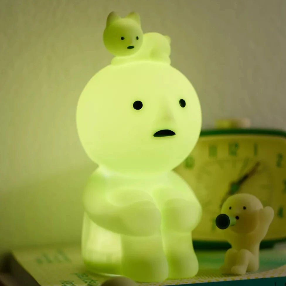Smiski touch light warmly lit on nightstand kawaii bedroom ambient glow decor - Overrated Korean Beauty & More