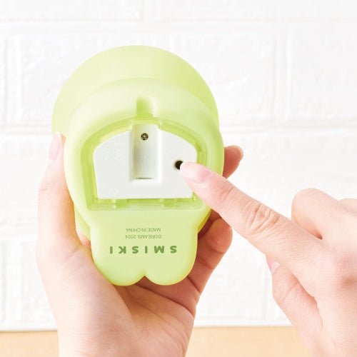 Smiski touch light side angle view green figure kawaii Daydreaming Living Series desk decor - Overrated Korean Beauty & More